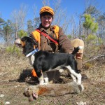 Eric Braselton with one of his beagles after a great hunt.